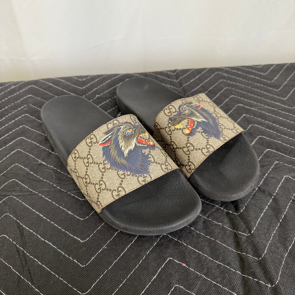 Gucci Beige GG Canvas Slides with Blue Wolf Motif and Black Footbed
